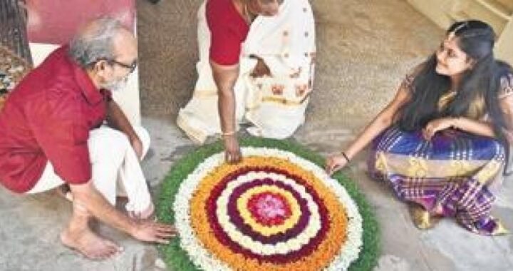 A family drawing pookolam on the eve of Onam at Annanur