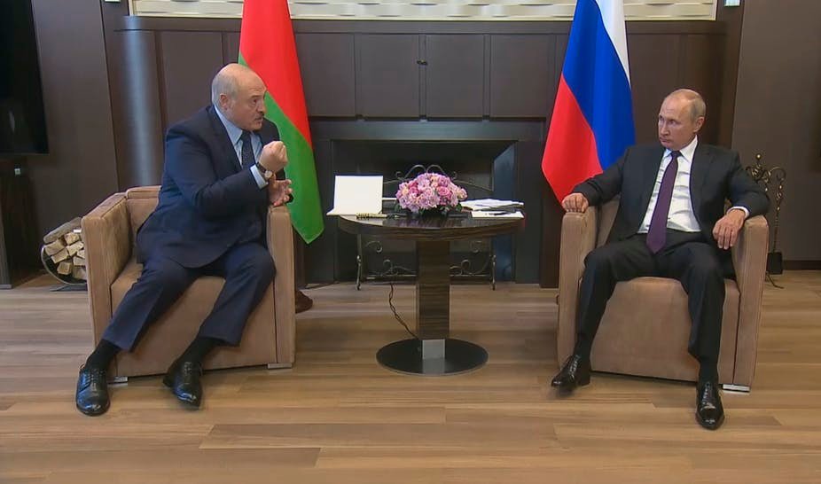 Watch the body language: Alexander Lukashenko meets Vladimir Putin in Sochi on September 14.