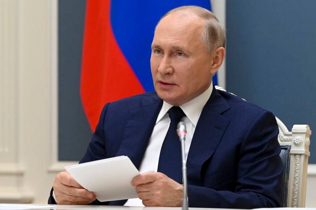 Russian President Vladimir Putin takes part in a video call with Belarusian President Alexander Lukashenko and Russian and Belarusian officials in Moscow, Russia, Thursday, July 1, 2021.