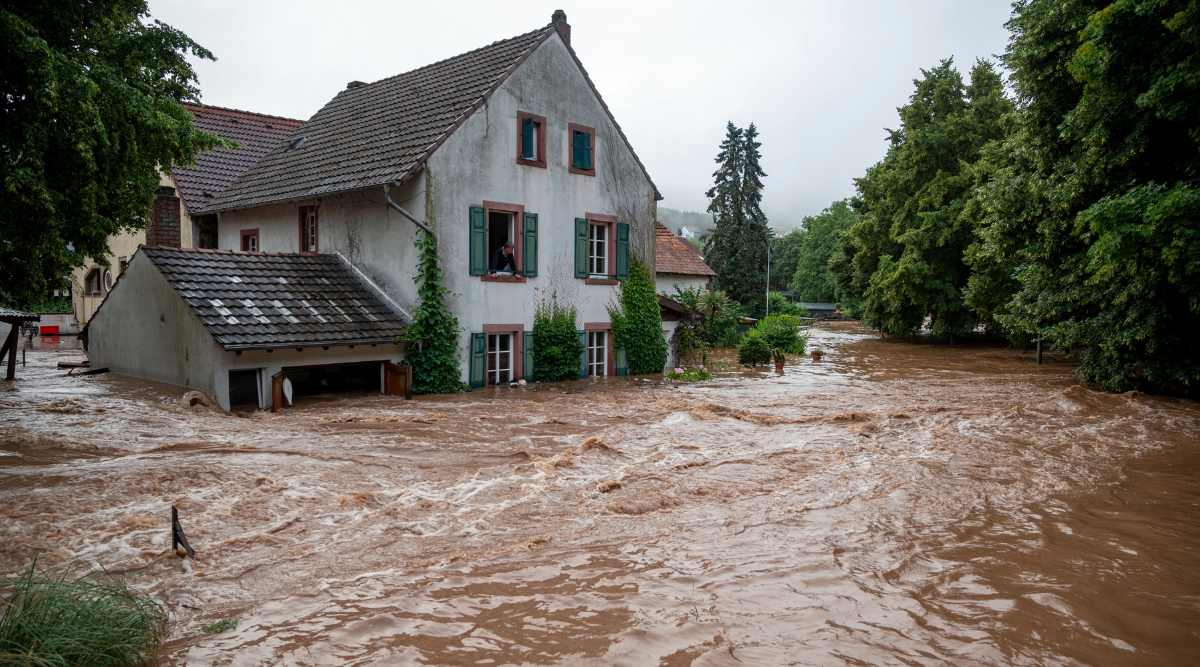 Houses are submerged on the overflowed river banks in Erdorf, Germany, as the village was flooded on Thursday.