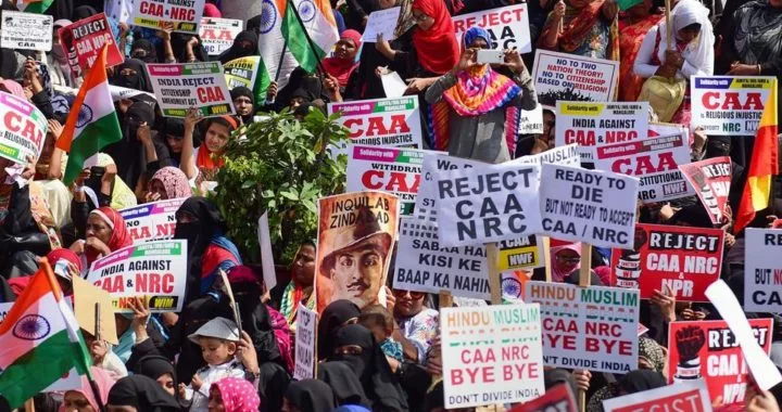 Members of Women India Movement protest against the Citizenship Amendment Act (CAA), National Register of Citizenship (NRC) and National Population Register (NPR) in Bengaluru on December 26, 2019.