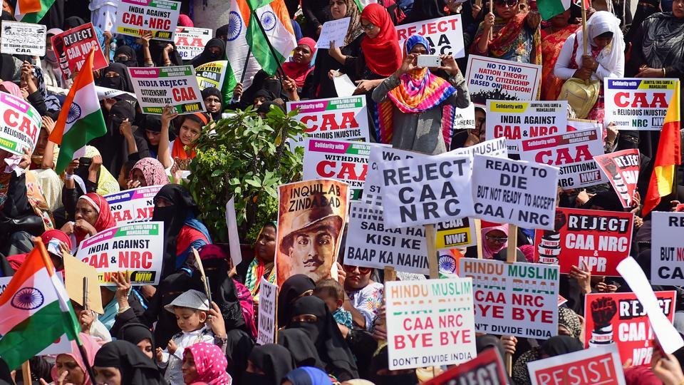 Members of Women India Movement protest against the Citizenship Amendment Act (CAA), National Register of Citizenship (NRC) and National Population Register (NPR) in Bengaluru on December 26, 2019.