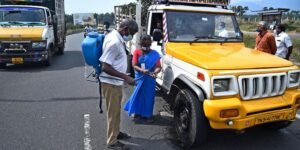 Vehicles entering Tamil Nadu via Walayar check post at outskirts of Coimbatore being disinfected