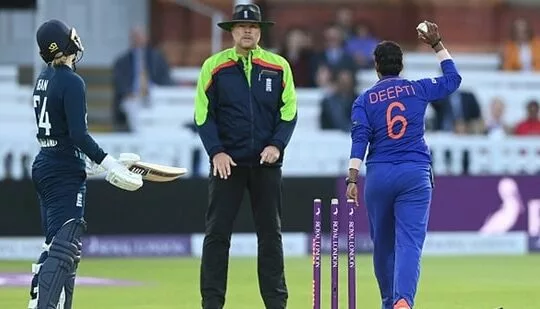 Charlie Dean of England reacts after being run out by Deepti Sharma of India(Getty)